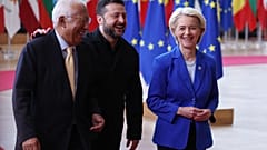 From left, European Council President Antonio Costa, Ukraine's President Volodymyr Zelenskyy and European Commission President Ursula von der Leyen arrive for the EU summit in