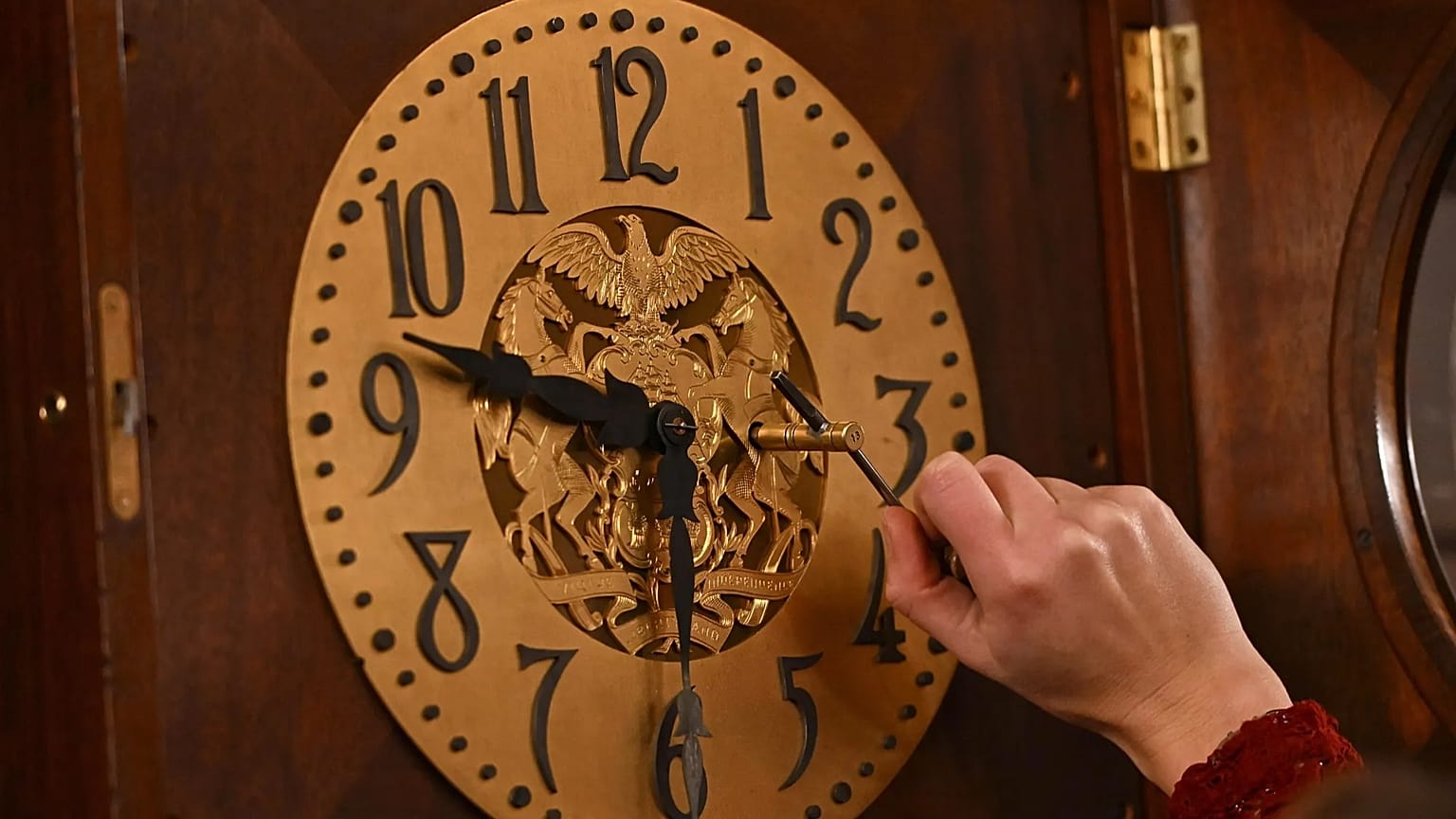 FILE PHOTO – Bethany Gill adjusts a clock in the Pennsylvania Supreme Court chamber on 13 December 2024 in Harrisburg, Pennsylvania.