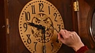 FILE PHOTO – Bethany Gill adjusts a clock in the Pennsylvania Supreme Court chamber on 13 December 2024 in Harrisburg, Pennsylvania.