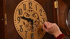 FILE PHOTO – Bethany Gill adjusts a clock in the Pennsylvania Supreme Court chamber on 13 December 2024 in Harrisburg, Pennsylvania.