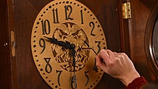 FILE PHOTO – Bethany Gill adjusts a clock in the Pennsylvania Supreme Court chamber on 13 December 2024 in Harrisburg, Pennsylvania.