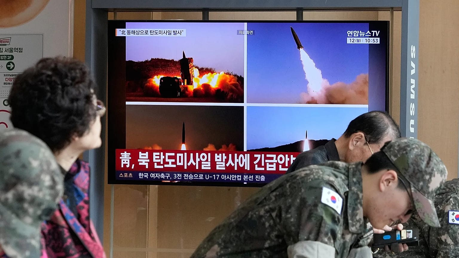 A TV screen shows file images of North Korean missiles launch during a news program at Seoul Railway Station in Seoul, South Korea, Monday, Oct. 12, 2026.