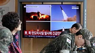 A TV screen shows file images of North Korean missiles launch during a news program at Seoul Railway Station in Seoul, South Korea, Monday, Oct. 12, 2026.