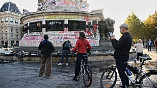 Smashed storefronts, burned buildings: France wakes up to aftermath of violent protests