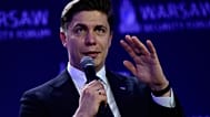 Premier Litwy Mindaugas Sinkevicius gestykuluje podczas przemówienia na Forum Bezpieczeństwa w Warszawie, w poniedziałek 12 października 2026 r.