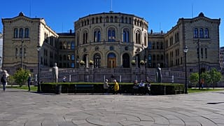 People gather in front of Norway's Parliament the Storting, in Oslo, Norway, Thursday, Sept. 10, 2026.
