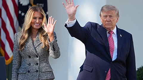 President Donald Trump, with first lady Melania Trump, wave following an event about women's health, in the Rose Garden of the White House, Monday, Oct. 19, 2026,