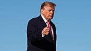 President Donald Trump walks to board Air Force One, Monday, Oct. 19, 2026, at Joint Base Andrews, Md. (AP Photo/Julia Demaree Nikhinson)
