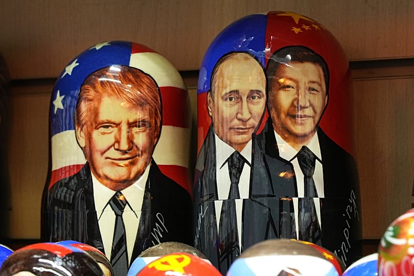 Images of Trump, Putin and China's Xi Jinping are displayed for sale at a souvenir shop in St. Petersburg, Russia, Thursday, Sept. 24, 2026. (AP Photo/Dmitri Lovetsk