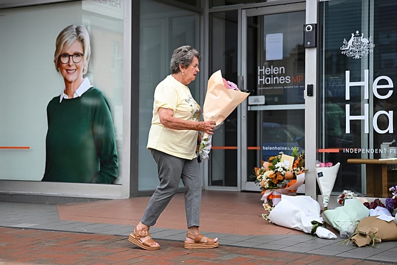 A woman delivers flowers at the electoral office of Helen Haines in Wangaratta, 20 October, 2026