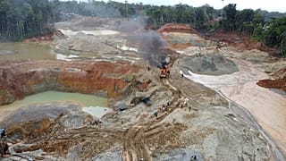 FILE: Police dismantle an illegal gold mining operation in Magüí Payán, Colombia, on Tuesday 20 April 2021.