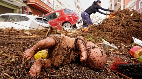 This image of a child's doll caught up in the Valencia floods in 2024 became a haunting depiction of the tragedy. 