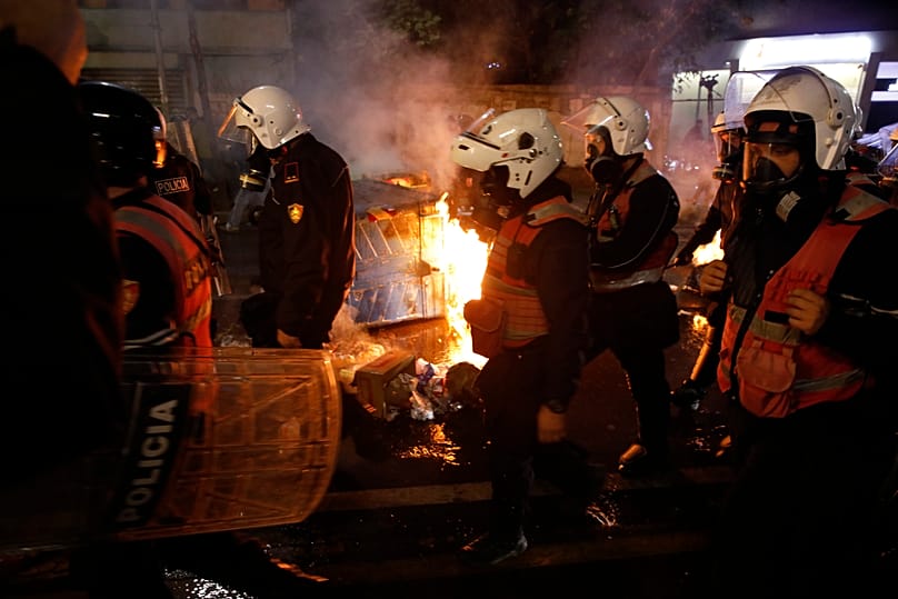 Riot police respond during clashes at an anti-government protest in Tirana, 19 October, 2026
