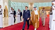 Qatar's Defence Minister Sheikh Saoud bin Abdulrahman Al Thani welcomes French President Emmanuel Macron in Doha, 20 October 2026.