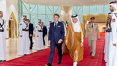Qatar's Defence Minister Sheikh Saoud bin Abdulrahman Al Thani welcomes French President Emmanuel Macron in Doha, 20 October 2026.