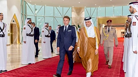Qatar's Defence Minister Sheikh Saoud bin Abdulrahman Al Thani welcomes French President Emmanuel Macron in Doha, 20 October 2026.