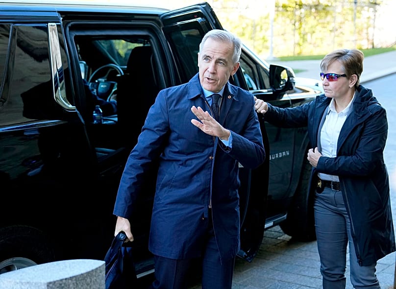  Mark Carney arrives for a meeting of the federal cabinet on Parliament Hill in Ottawa, on Tuesday, Oct. 20, 2026. (Justin Tang /The Canadian Press via AP)