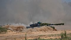 Egy Leopard 2A7V típusú német harckocsi részt vesz a Litvánia fővárosától, Vilniustól északra zajló nemzetközi litván–német hadgyakorlaton 2024. május 29-én.
