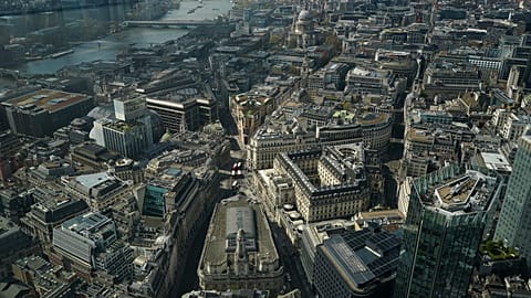 FILE - View of the Bank of England and the Royal Exchange from the Lookout viewing point, in London, Wednesday, April 9, 2025. 