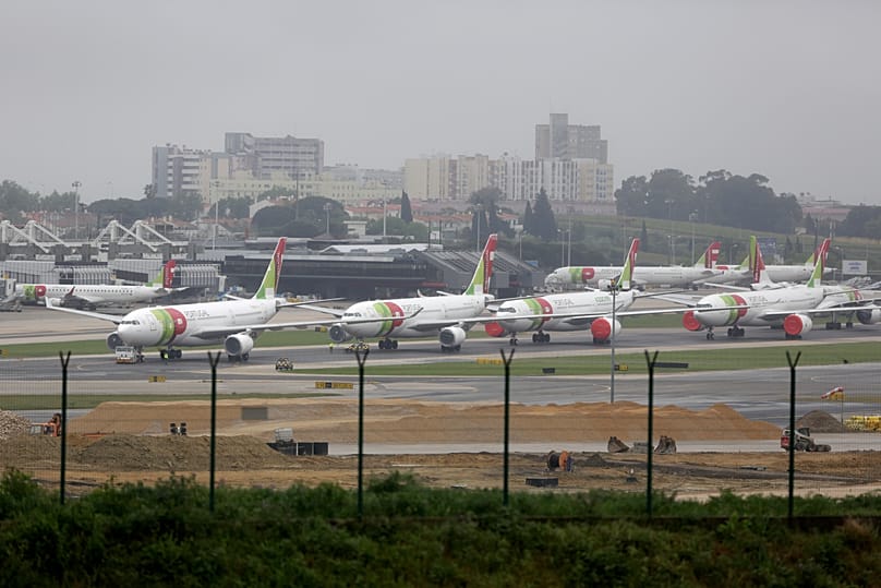 FILE. TAP Air Portugal airplanes parked idle at Lisbon airport, 9 April 2020