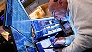 FILE - Markets trading floor