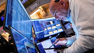 FILE - Markets trading floor