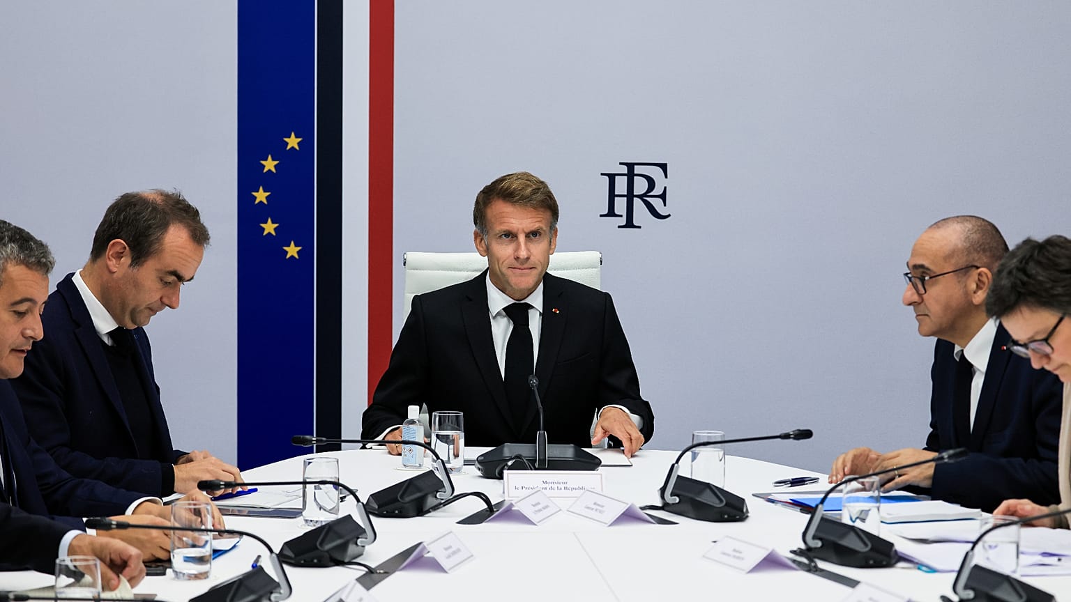 France's President Emmanuel Macron, center, hosts an Interministerial Crisis Meeting at the Elysee Presidential Palace, in Paris, on Sunday, 18 October 2026.