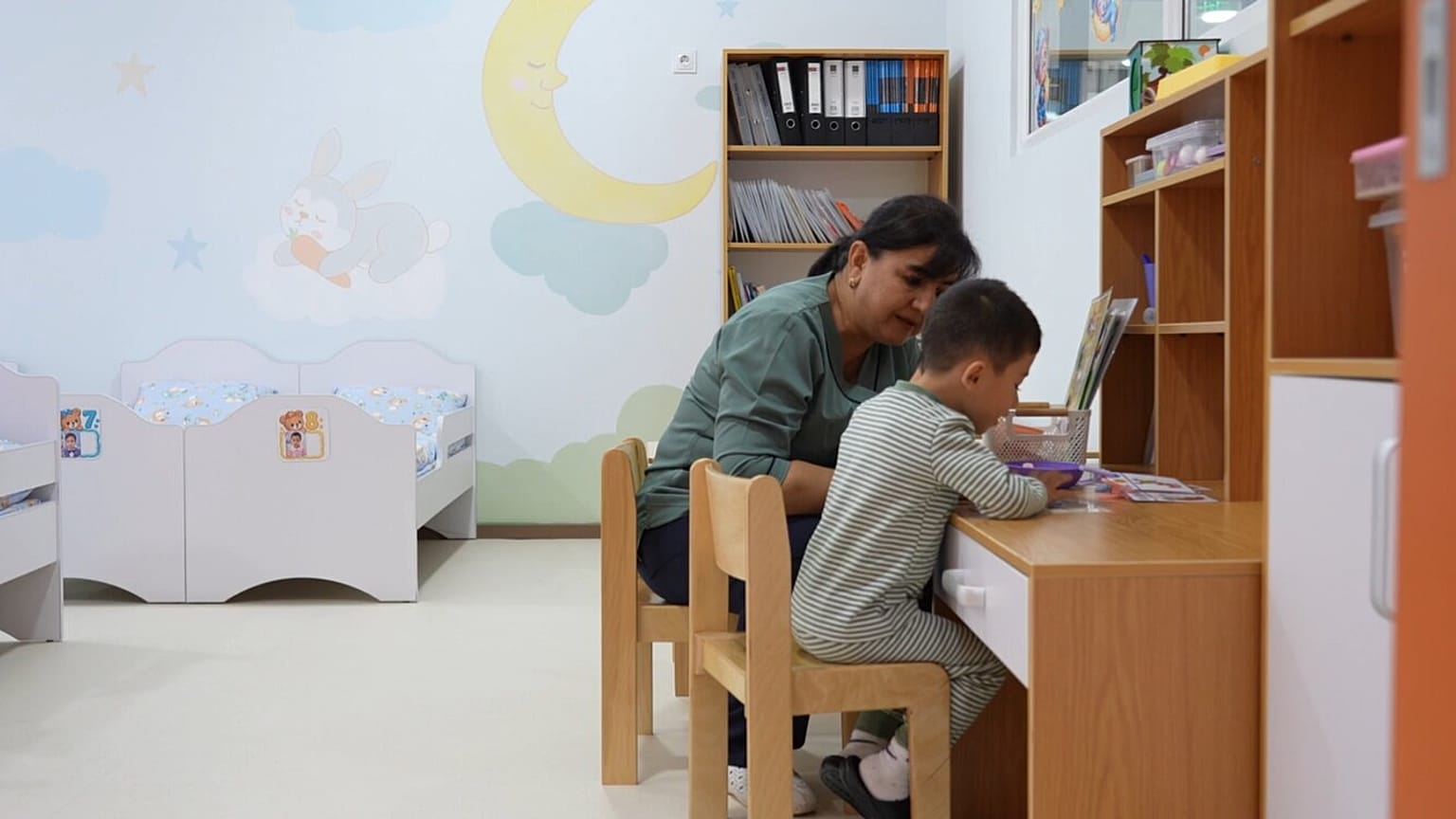 A child at the Imkon Center in Samarkand