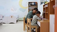 A child at the Imkon Center in Samarkand