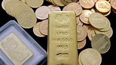 FILE. Gold coins and gold bars are shown at the California Numismatic Investments, Inc. in Inglewood California, 13 March 2008