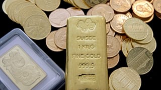 FILE. Gold coins and gold bars are shown at the California Numismatic Investments, Inc. in Inglewood California, 13 March 2008