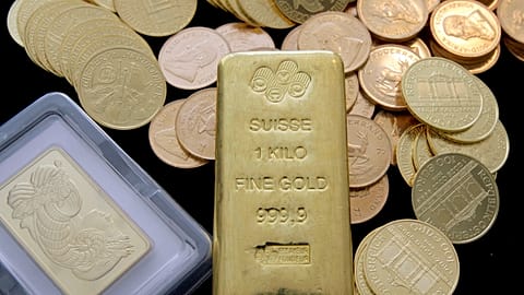 FILE. Gold coins and gold bars are shown at the California Numismatic Investments, Inc. in Inglewood California, 13 March 2008