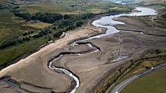 Woodhead reservoir is visible amid a drought near Manchester, England, Thursday, Aug. 13, 2026.