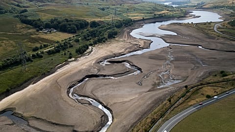 Woodhead reservoir is visible amid a drought near Manchester, England, Thursday, Aug. 13, 2026.