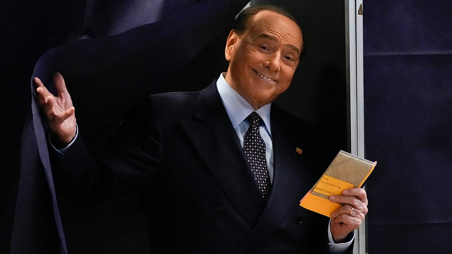  Silvio Berlusconi, leader of center-right, populist Forza Italia exits a voting booth before casting his ballot at a polling station in Milan, Italy, Sept. 25, 2022