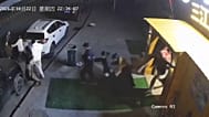 Surveillance camera footage showing earthquake, people evacuating buildings