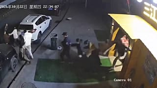 Surveillance camera footage showing earthquake, people evacuating buildings