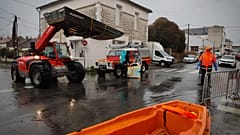 Emergency services operate near a flooded street in Saintes, as severe flooding hits western France due to Storm Pedro, on 18 February 2026