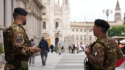 Soldiers patrol the area next to Milan's Duomo cathedral, Italy, Friday 23 October 2026. (AP Photo/Luca Bruno)
