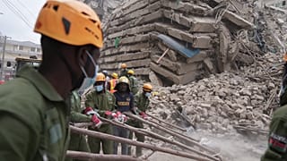 Security forces and civil defense work after a multi-story building collapsed in Nairobi