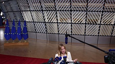 Italy's Prime Minister Giorgia Meloni speaks with the media at the end of the EU summit in Brussels, Friday, Oct. 16, 2026. 