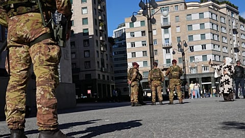 Italian army paratroopers patrol the streets of Milan, Saturday, Oct. 24, 2026