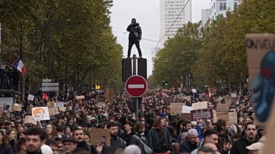 Protesters march during a demonstration against rising living costs in Paris, Saturday, Oct. 24, 2026.