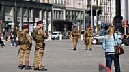 Italian army paratroopers patrol the streets of Milan, Saturday, Oct. 24, 2026.