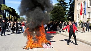 Protesters gather outside the Prime Minister's office during an anti-government rally, in Tirana, Albania, Saturday, Oct. 24, 2026.
