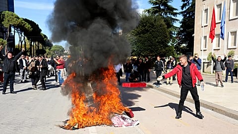 Protesters gather outside the Prime Minister's office during an anti-government rally, in Tirana, Albania, Saturday, Oct. 24, 2026.