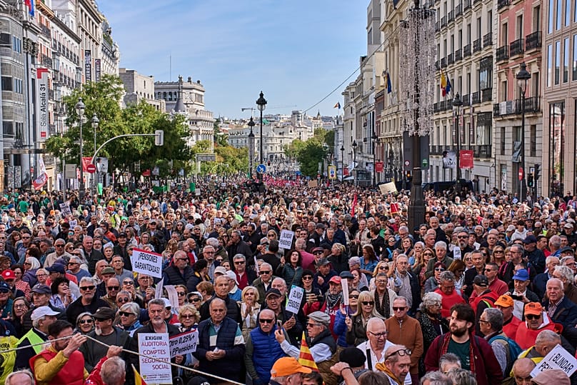Pensioners and supporters march to defend their retirement rights in Madrid, Spain, Saturday, Oct. 24, 2026. (AP Photo/Bernat Armangue)