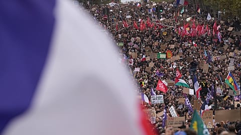 Protesters march during a demonstration against rising living costs in Paris, Saturday, 24 Oct, 2026.