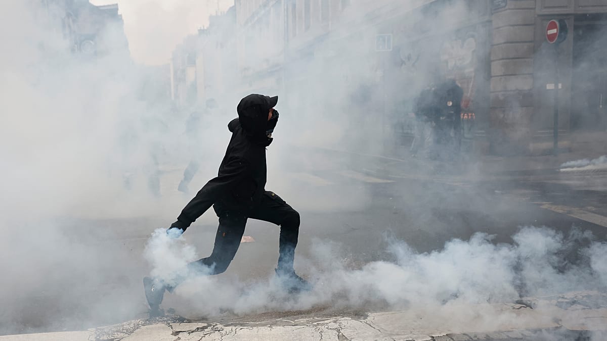 Almost 1,000 arrests across France as protesters clashed with police