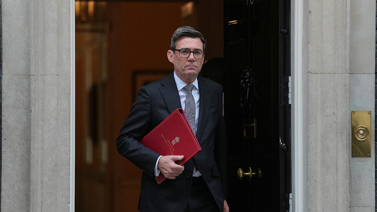 Britain's Prime Minister Andy Burnham leaves 10 Downing Street to attend parliament in London, Wednesday, Oct. 21, 2026. (AP P